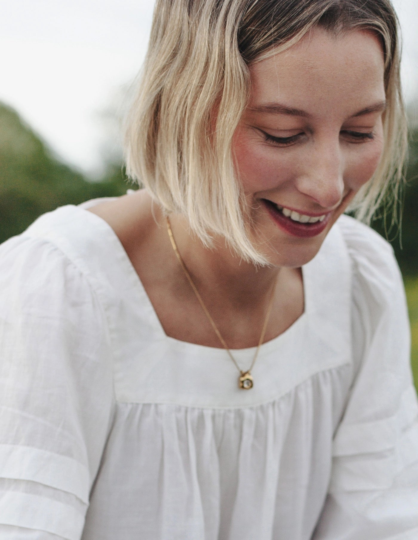 Gold Fluid Pendant Necklace